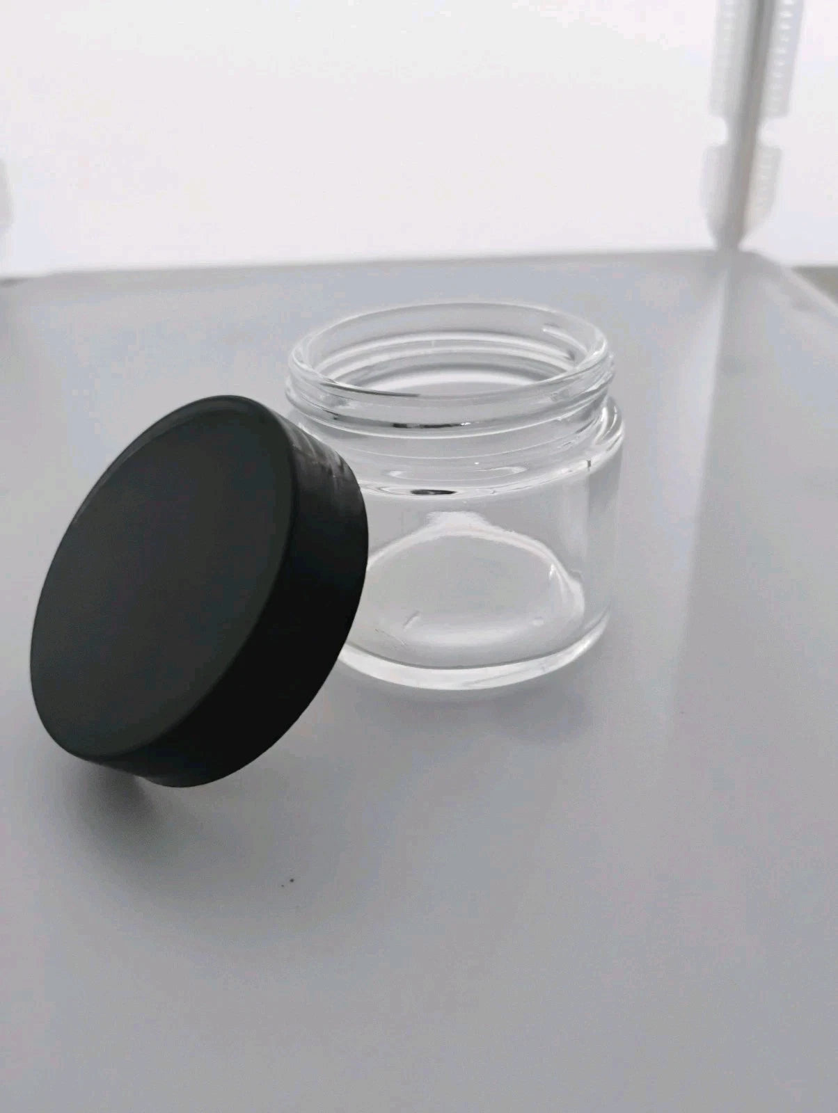 2 oz Straight Sided Clear Glass Jar And Smooth Black Lid With Liner Pack Of 20